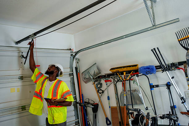Professional Garage Door Roller Replacement technician working in Mason City, IA